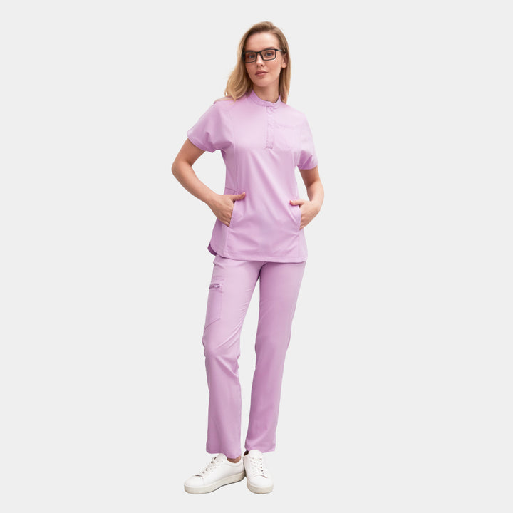 Full front view of Allscrubs Women’s Serene scrub set in lilac, showing collared top and straight-leg pants