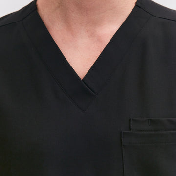 Close-up of neckline on Allscrubs Men’s Zen Scrub Top in black