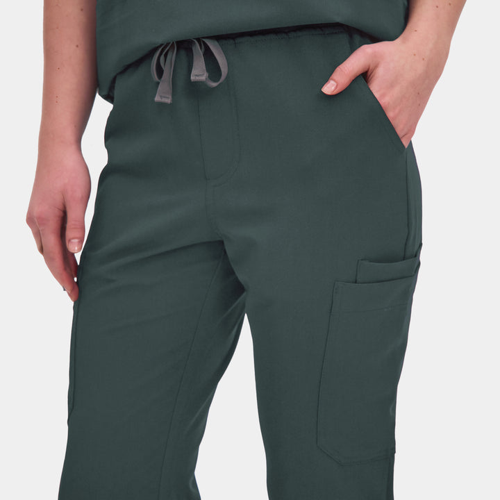 Front view of Allscrubs Women's Mild Cargo Scrub Pants in Forest Green