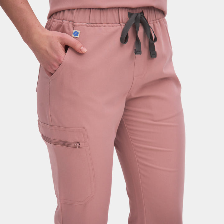 Front view of Allscrubs Women's Mild Cargo Scrub Pants in Pink Essence