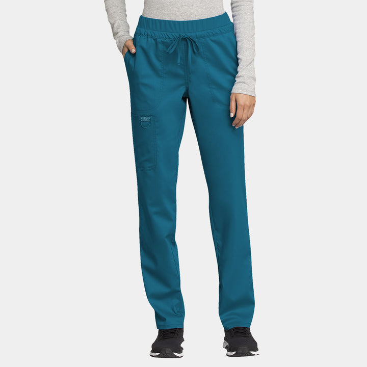 Front view of Cherokee Revolution WW105 women’s tapered drawstring scrub pants in caribbean
