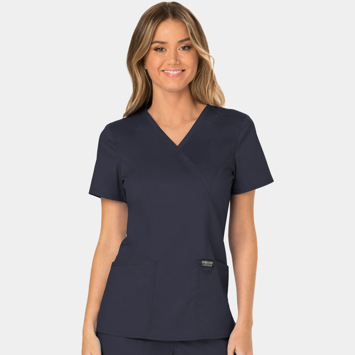 Front view of Cherokee Revolution WW610 women’s mock wrap scrub top in pewter
