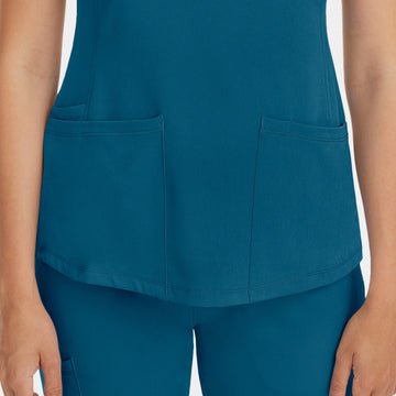 Front pockets of Healing Hands HH Works Monica V-Neck Scrub Top in Caribbean
