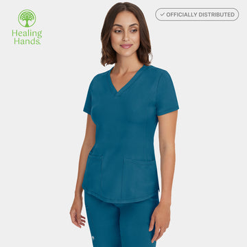 Half side view of Healing Hands HH Works Monica V-Neck Scrub Top in Caribbean