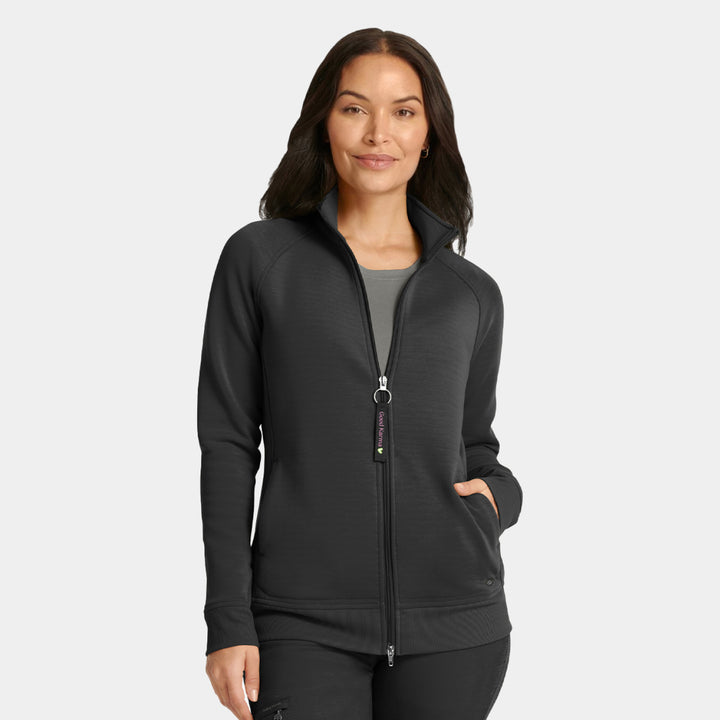 Front view of Healing Hands Karma women's scrub jacket in black featuring zipper closure and front pockets