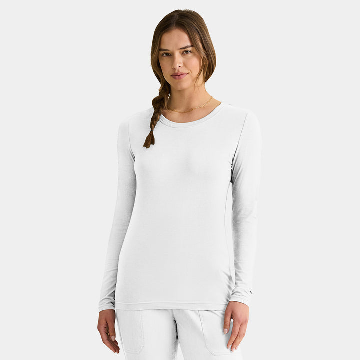 Front view of Healing Hands Melissa women's long sleeve knit tee in white for layering under scrubs